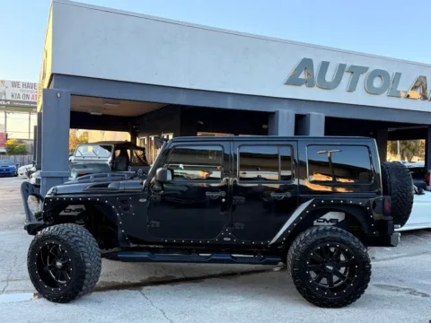 Photos of 2014 Jeep Wrangler Unlimited Sahara for sale in Jacksonville, FL at AUTOLAND