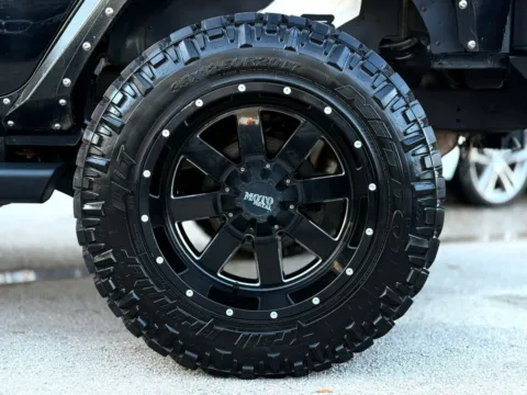 Another view of 2014 Jeep Wrangler Unlimited Sahara for sale in Jacksonville, FL at AUTOLAND