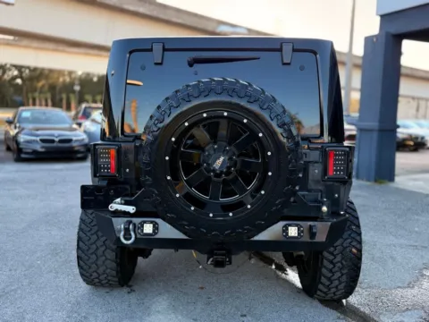 More photos of 2014 Jeep Wrangler Unlimited Sahara at AUTOLAND, FL