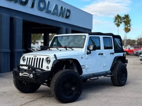 White 2016 Jeep Wrangler Unlimited Sport for sale in Jacksonville, FL