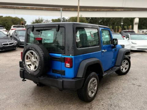 More photos of 2015 Jeep Wrangler Sport at AUTOLAND, FL