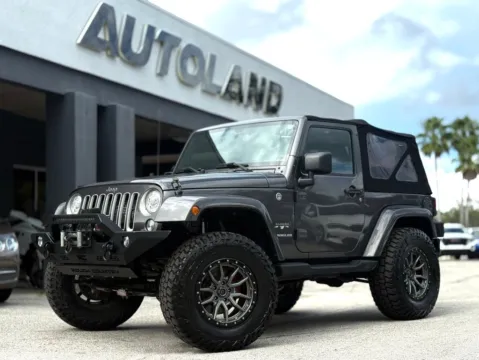 Gray 2017 Jeep Wrangler Sahara for sale in Jacksonville, FL