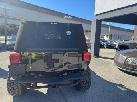 More photos of 2015 Jeep Wrangler Sport at AUTOLAND, FL