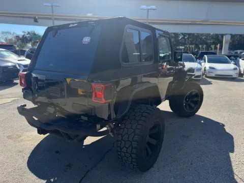 More photos of 2015 Jeep Wrangler Sport at AUTOLAND, FL