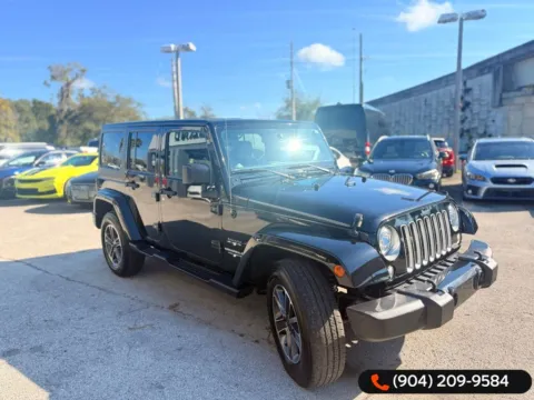 More photos of 2017 Jeep Wrangler Unlimited Sahara at AUTOLAND, FL