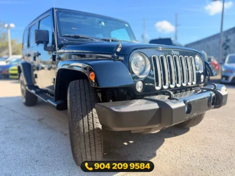 More photos of 2017 Jeep Wrangler Unlimited Sahara at AUTOLAND, FL