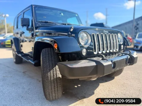 More photos of 2017 Jeep Wrangler Unlimited Sahara at AUTOLAND, FL