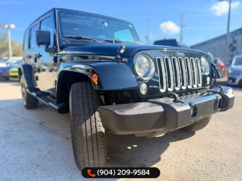 More photos of 2017 Jeep Wrangler Unlimited Sahara at AUTOLAND, FL