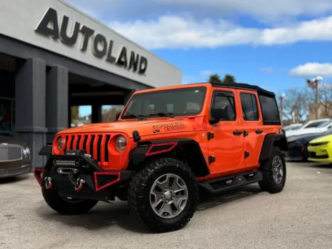 Orange 2019 Jeep Wrangler Unlimited Sport S for sale in Jacksonville, FL