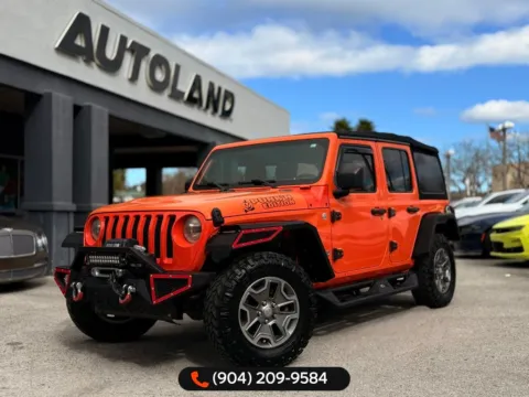 Orange 2019 Jeep Wrangler Unlimited Sport S for sale in Jacksonville, FL