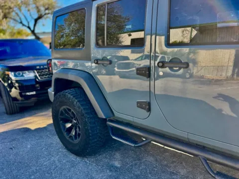 Another view of 2015 Jeep Wrangler Unlimited Sport for sale in Jacksonville, FL at AUTOLAND