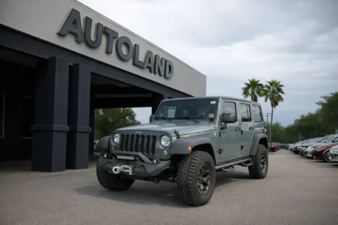 Gray 2015 Jeep Wrangler Unlimited Sport for sale in Jacksonville, FL