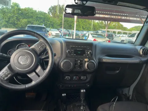 Another view of 2015 Jeep Wrangler Unlimited Sport for sale in Jacksonville, FL at AUTOLAND