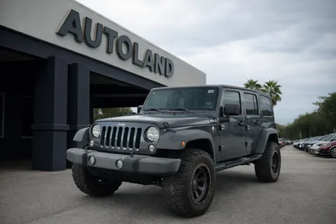 Gray 2017 Jeep Wrangler Unlimited Sport for sale in Jacksonville, FL
