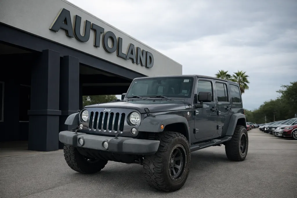 Gray 2017 Jeep Wrangler Unlimited Sport for sale in Jacksonville, FL