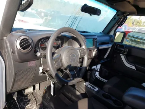 More photos of 2017 Jeep Wrangler Unlimited Sport at AUTOLAND, FL