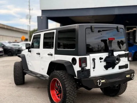 More photos of 2017 Jeep Wrangler Unlimited Sahara at AUTOLAND, FL