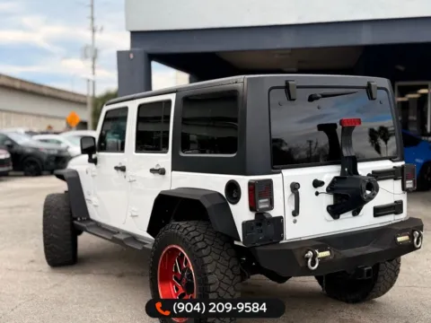 More photos of 2017 Jeep Wrangler Unlimited Sahara at AUTOLAND, FL