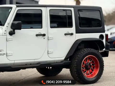 Another view of 2017 Jeep Wrangler Unlimited Sahara for sale in Jacksonville, FL at AUTOLAND