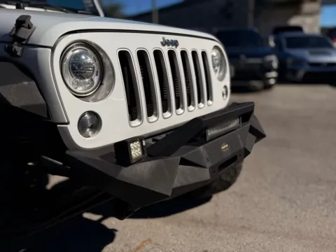 More photos of 2017 Jeep Wrangler Unlimited Sahara at AUTOLAND, FL