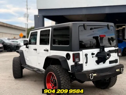 More photos of 2017 Jeep Wrangler Unlimited Sahara at AUTOLAND, FL