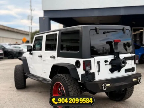 More photos of 2017 Jeep Wrangler Unlimited Sahara at AUTOLAND, FL