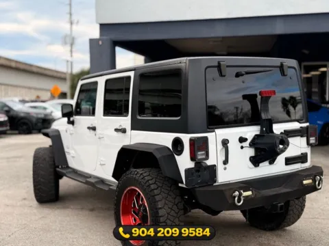 More photos of 2017 Jeep Wrangler Unlimited Sahara at AUTOLAND, FL