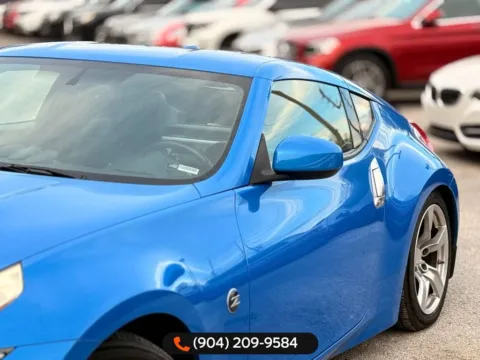 More photos of 2009 Nissan 370Z Touring at AUTOLAND, FL