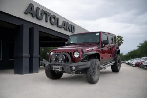 Red 2012 Jeep Wrangler Unlimited Rubicon for sale in Jacksonville, FL