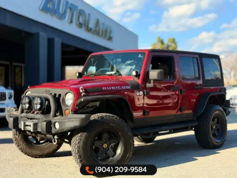 Red 2012 Jeep Wrangler Unlimited Rubicon for sale in Jacksonville, FL