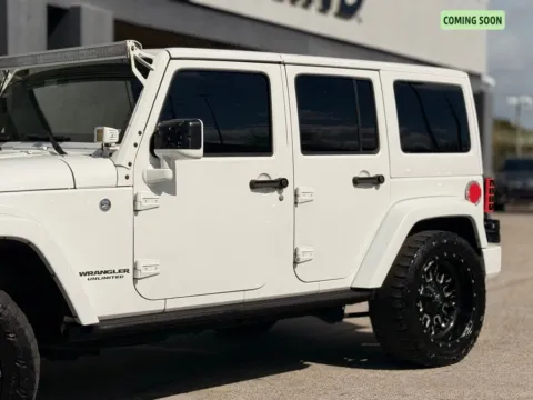 Another view of 2015 Jeep Wrangler Unlimited Sahara Altitude for sale in Jacksonville, FL at AUTOLAND