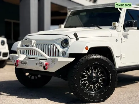 Photos of 2015 Jeep Wrangler Unlimited Sahara Altitude for sale in Jacksonville, FL at AUTOLAND