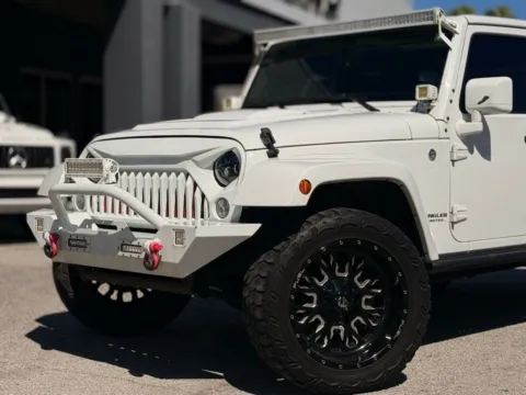 Photos of 2015 Jeep Wrangler Unlimited Sahara Altitude for sale in Jacksonville, FL at AUTOLAND