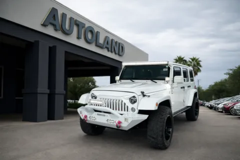 White 2015 Jeep Wrangler Unlimited Sahara Altitude for sale in Jacksonville, FL