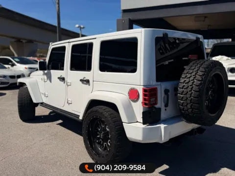 More photos of 2015 Jeep Wrangler Unlimited Sahara Altitude at AUTOLAND, FL