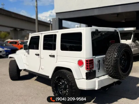 More photos of 2015 Jeep Wrangler Unlimited Sahara Altitude at AUTOLAND, FL
