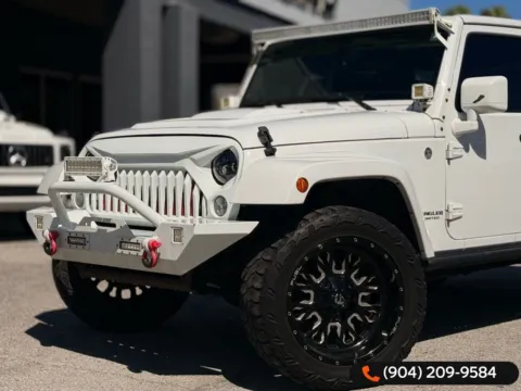 Photos of 2015 Jeep Wrangler Unlimited Sahara Altitude for sale in Jacksonville, FL at AUTOLAND