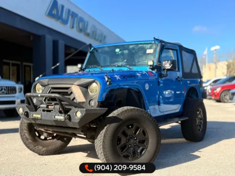 Blue 2016 Jeep Wrangler Willys Wheeler for sale in Jacksonville, FL