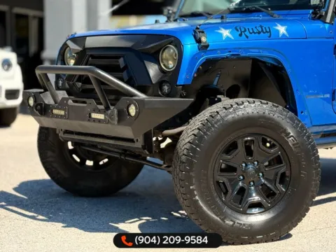 More photos of 2016 Jeep Wrangler Willys Wheeler at AUTOLAND, FL