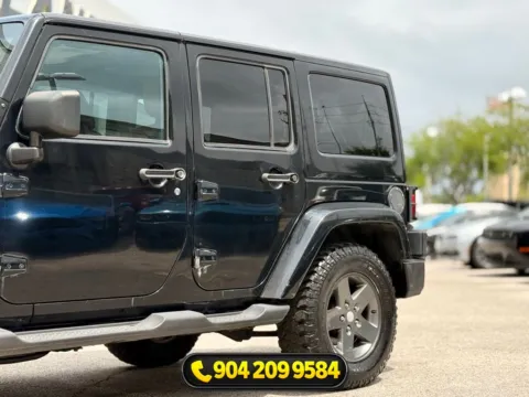 Another view of 2011 Jeep Wrangler Unlimited Sport S for sale in Jacksonville, FL at AUTOLAND