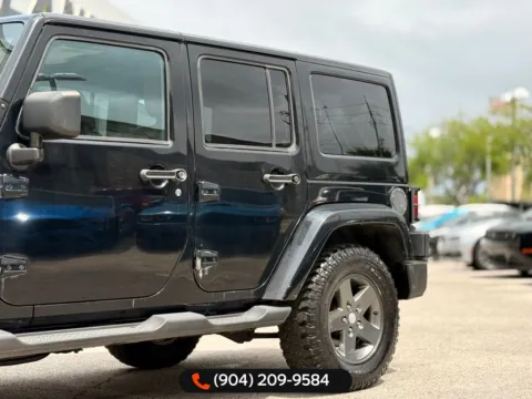 Another view of 2011 Jeep Wrangler Unlimited Sport S for sale in Jacksonville, FL at AUTOLAND