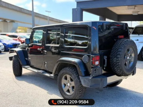 More photos of 2011 Jeep Wrangler Unlimited Sport S at AUTOLAND, FL