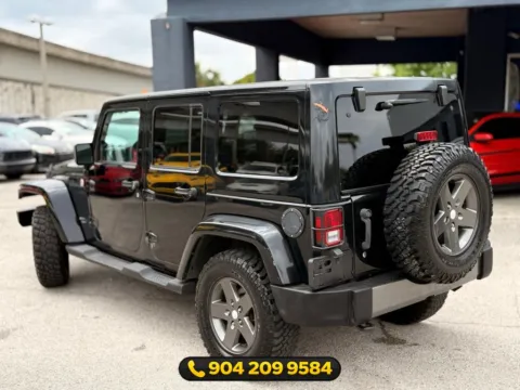 More photos of 2011 Jeep Wrangler Unlimited Sport S at AUTOLAND, FL