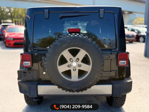 Another view of 2011 Jeep Wrangler Unlimited Sport S for sale in Jacksonville, FL at AUTOLAND