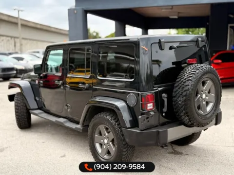 More photos of 2011 Jeep Wrangler Unlimited Sport S at AUTOLAND, FL