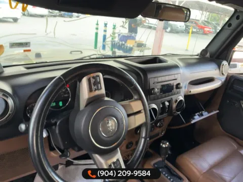 Photos of 2011 Jeep Wrangler Unlimited Sport S for sale in Jacksonville, FL at AUTOLAND