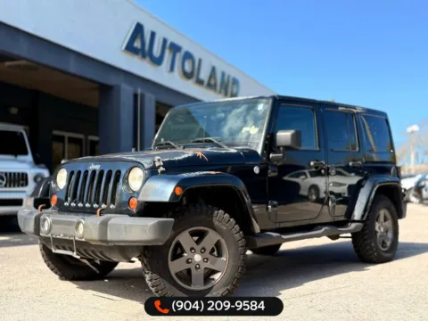 Black 2011 Jeep Wrangler Unlimited Sport S for sale in Jacksonville, FL