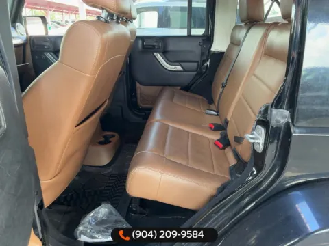 Another view of 2011 Jeep Wrangler Unlimited Sport S for sale in Jacksonville, FL at AUTOLAND