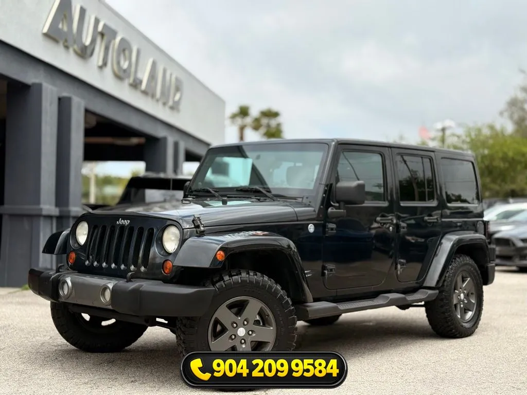 Black 2011 Jeep Wrangler Unlimited Sport S for sale in Jacksonville, FL