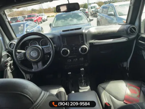 More photos of 2017 Jeep Wrangler Unlimited Sahara at AUTOLAND, FL